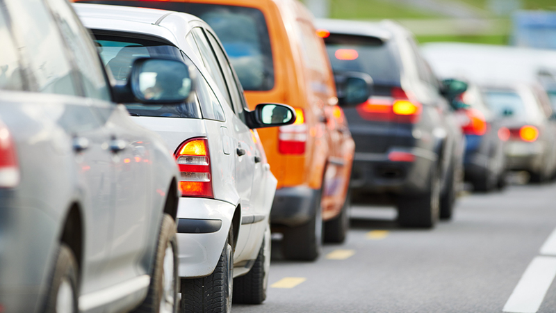 Cars in a traffic jam in the middle of a rush hour