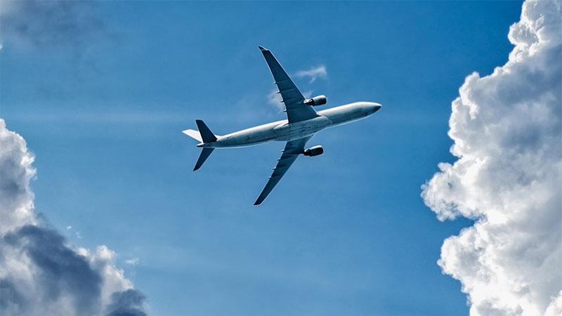 Jet aircraft in a stormy sky. Panoramic image.