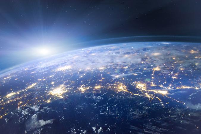 Sun rising behind Earth
