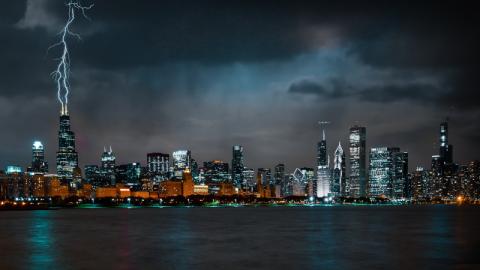 Lightning strikes a high rise building in Chicago at night