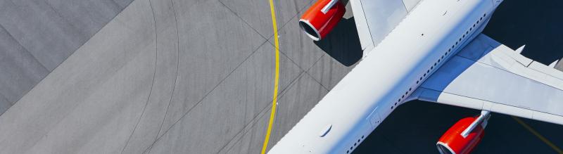 Aerial view of airplane on runway